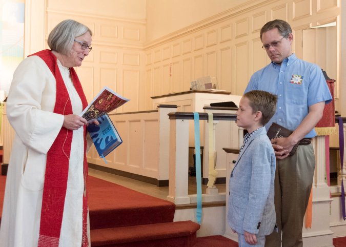 Bible presentation. Nate's father, Bob, brought the Bible he received in East Church when he graduated third grade!