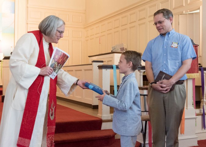 Bible presentation. Nate's father, Bob, brought the Bible he received in East Church when he graduated third grade!